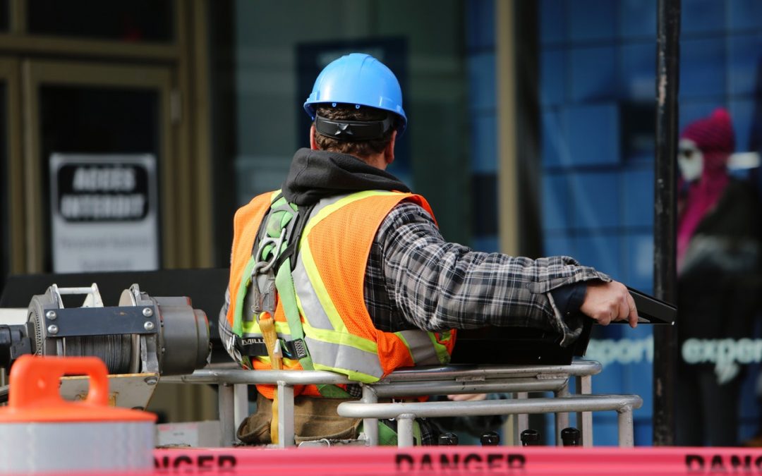 Construction worker using safety equipment