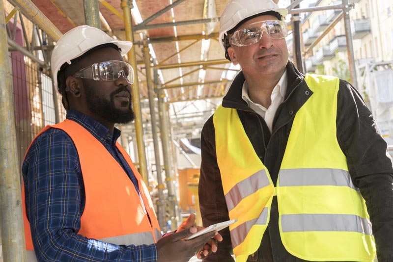 construction-workers-wearing-hard-hats