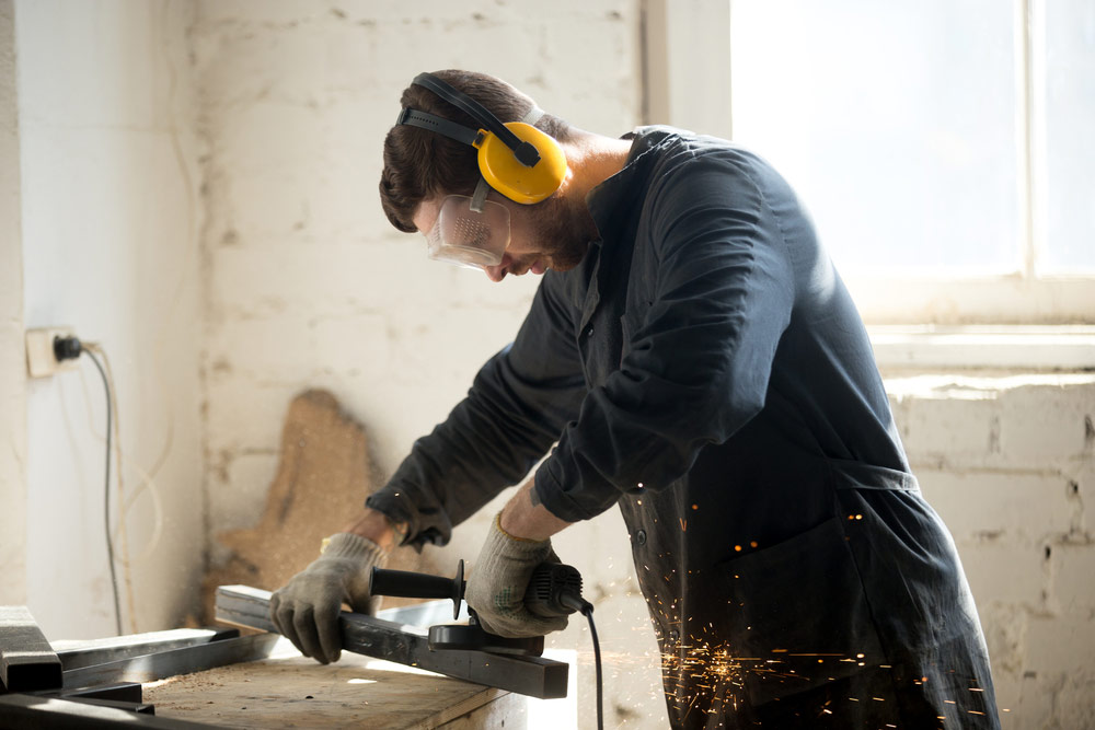 worker-wearing-hearing-protection