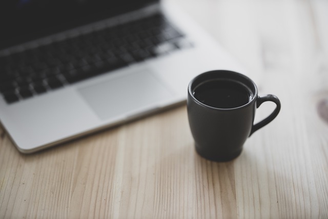 coffee and laptop Coffee and a laptop